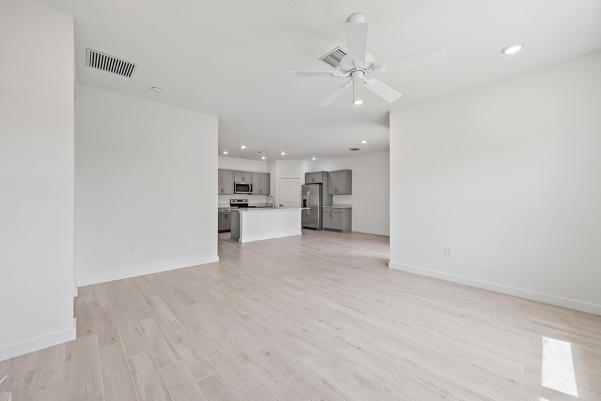 5880 Southeast Sky Blue Circle Stuart, FL 34997 - Photo 14 of 48 a view of a kitchen with a sink and cabinet