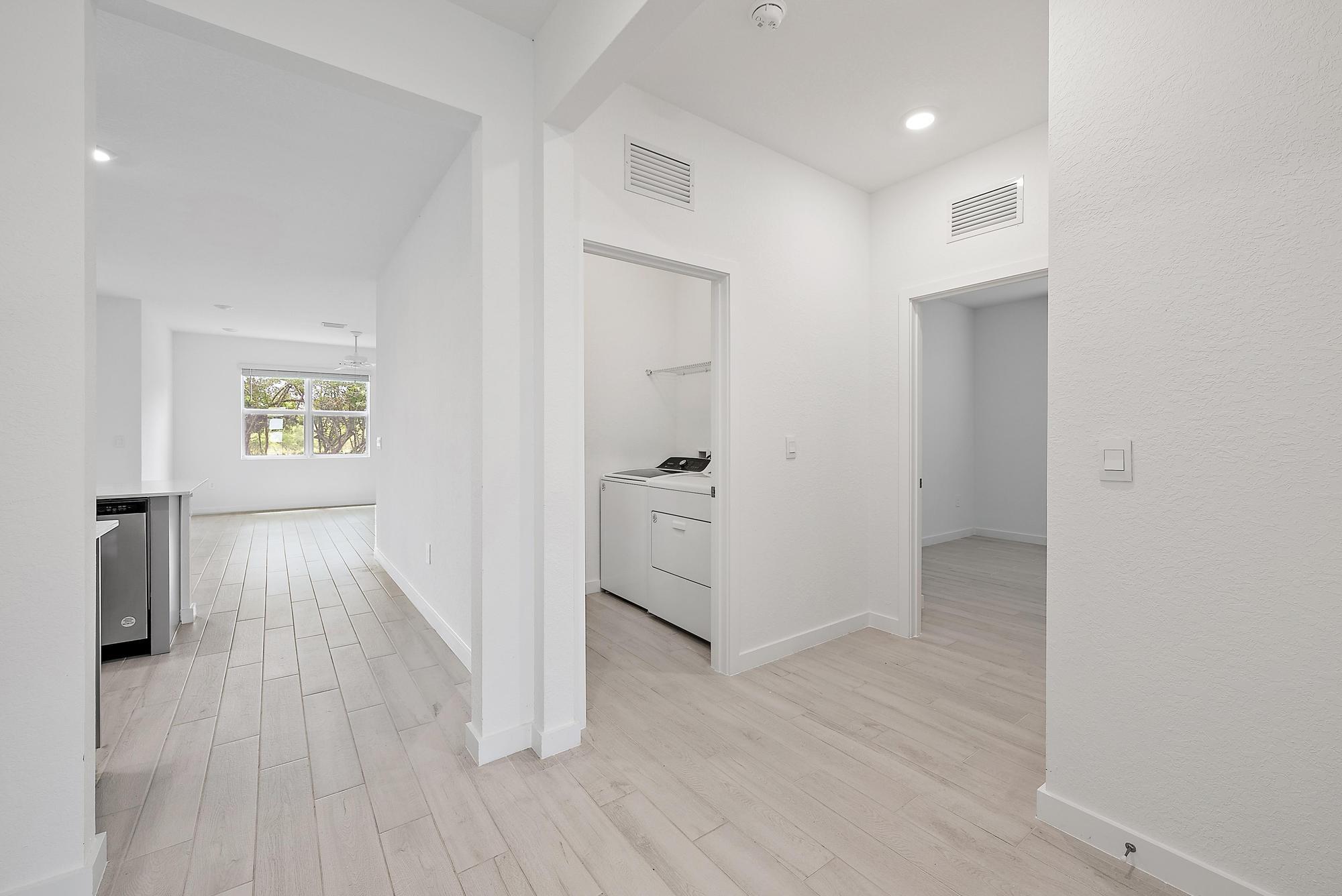 5880 Southeast Sky Blue Circle Stuart, FL 34997 - Photo 21 of 48 Hallway to Laundry and BR
