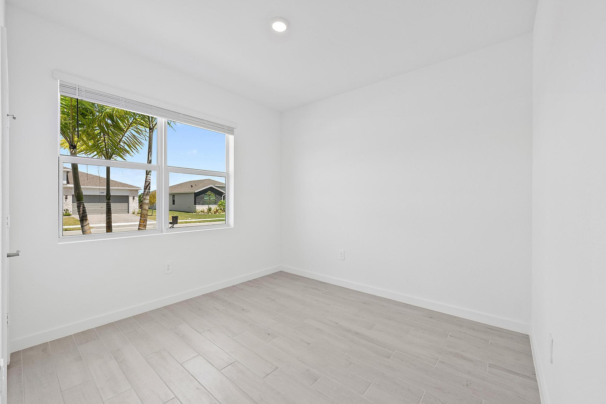 5880 Southeast Sky Blue Circle Stuart, FL 34997 - Photo 29 of 48 4th BR or Office w/View of Laker