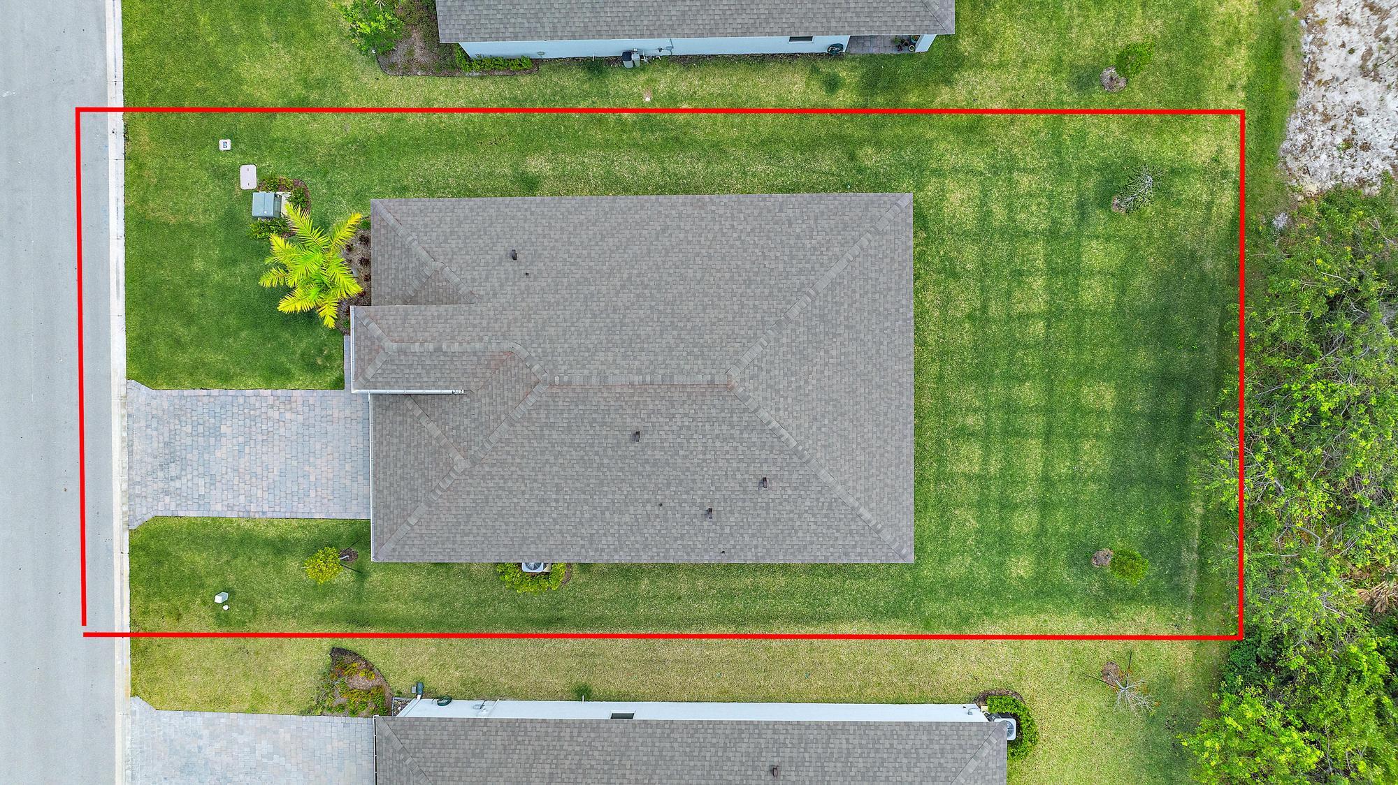 5880 Southeast Sky Blue Circle Stuart, FL 34997 - Photo 37 of 48 a view of a garden with a outdoor space