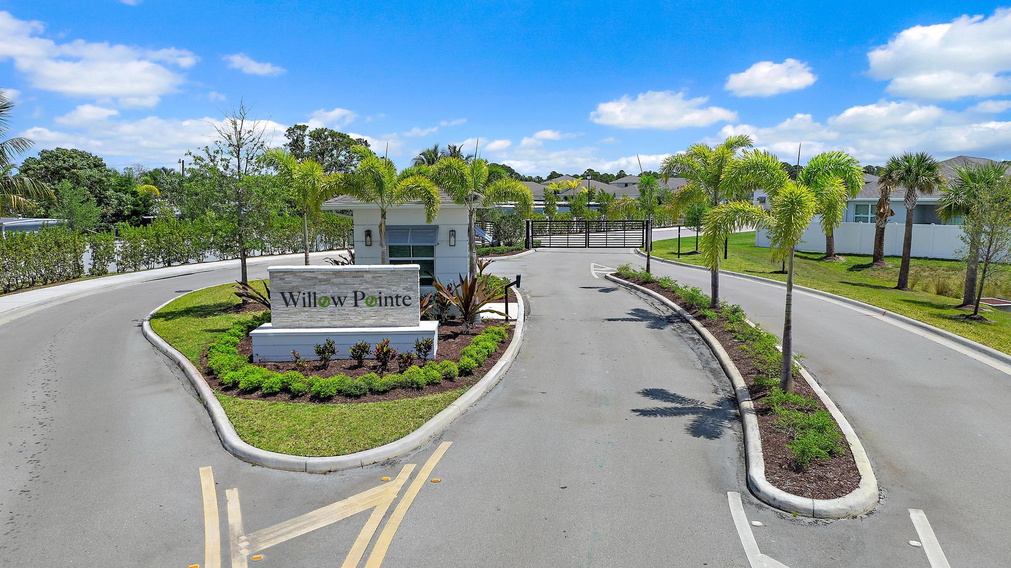5880 Southeast Sky Blue Circle Stuart, FL 34997 - Photo 46 of 48 a view of a swimming pool with a patio