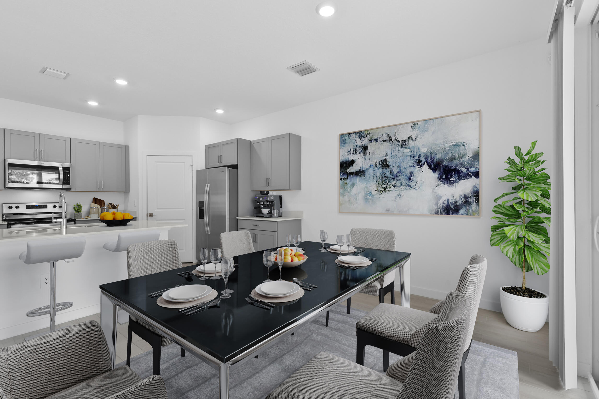 5880 Southeast Sky Blue Circle Stuart, FL 34997 - Photo 6 of 48 a living room with furniture and flowers