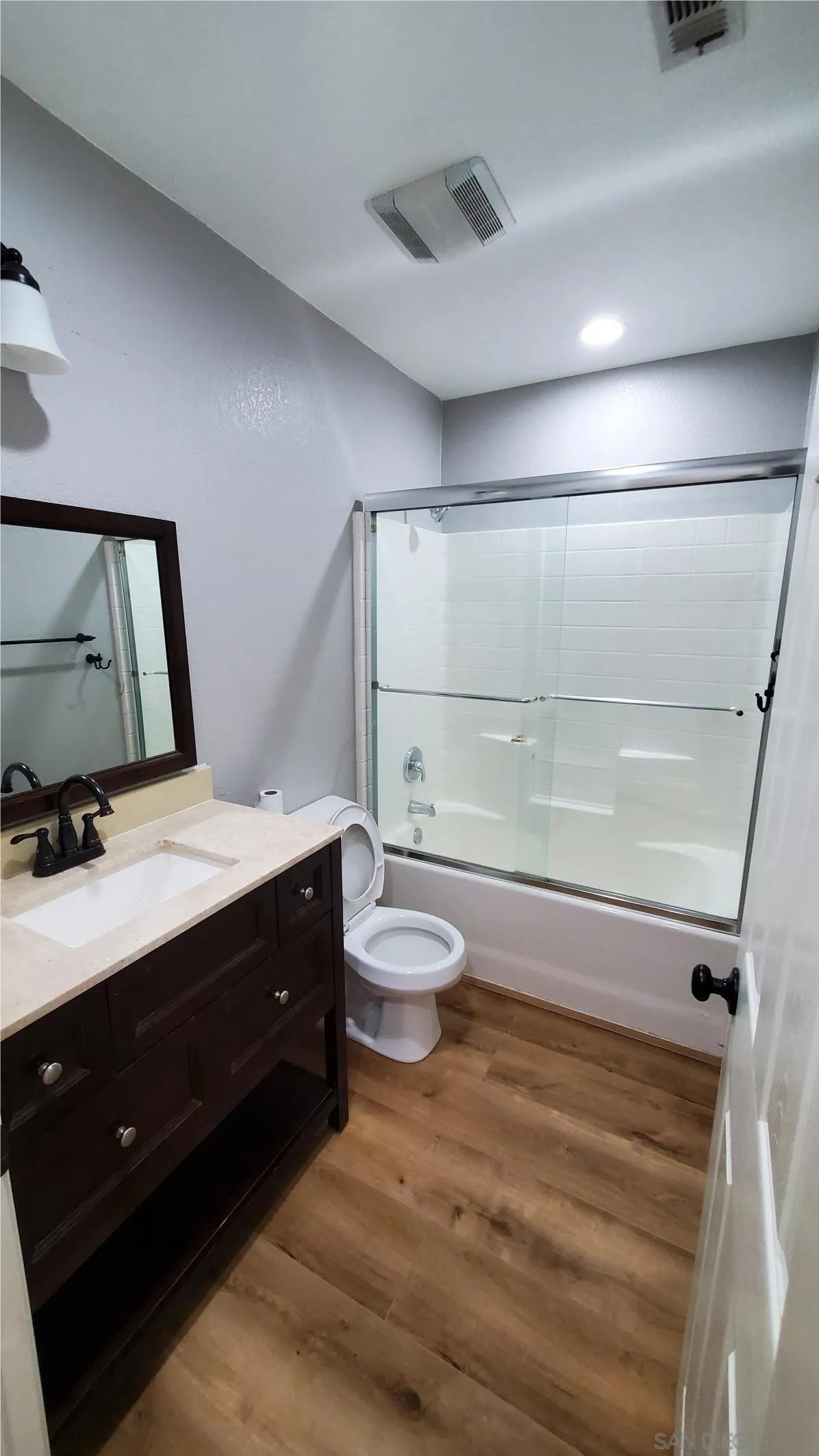 32812 Tulley Ranch Road Temecula, CA 92592 - Photo 13 of 27 a bathroom with a sink a toilet and shower