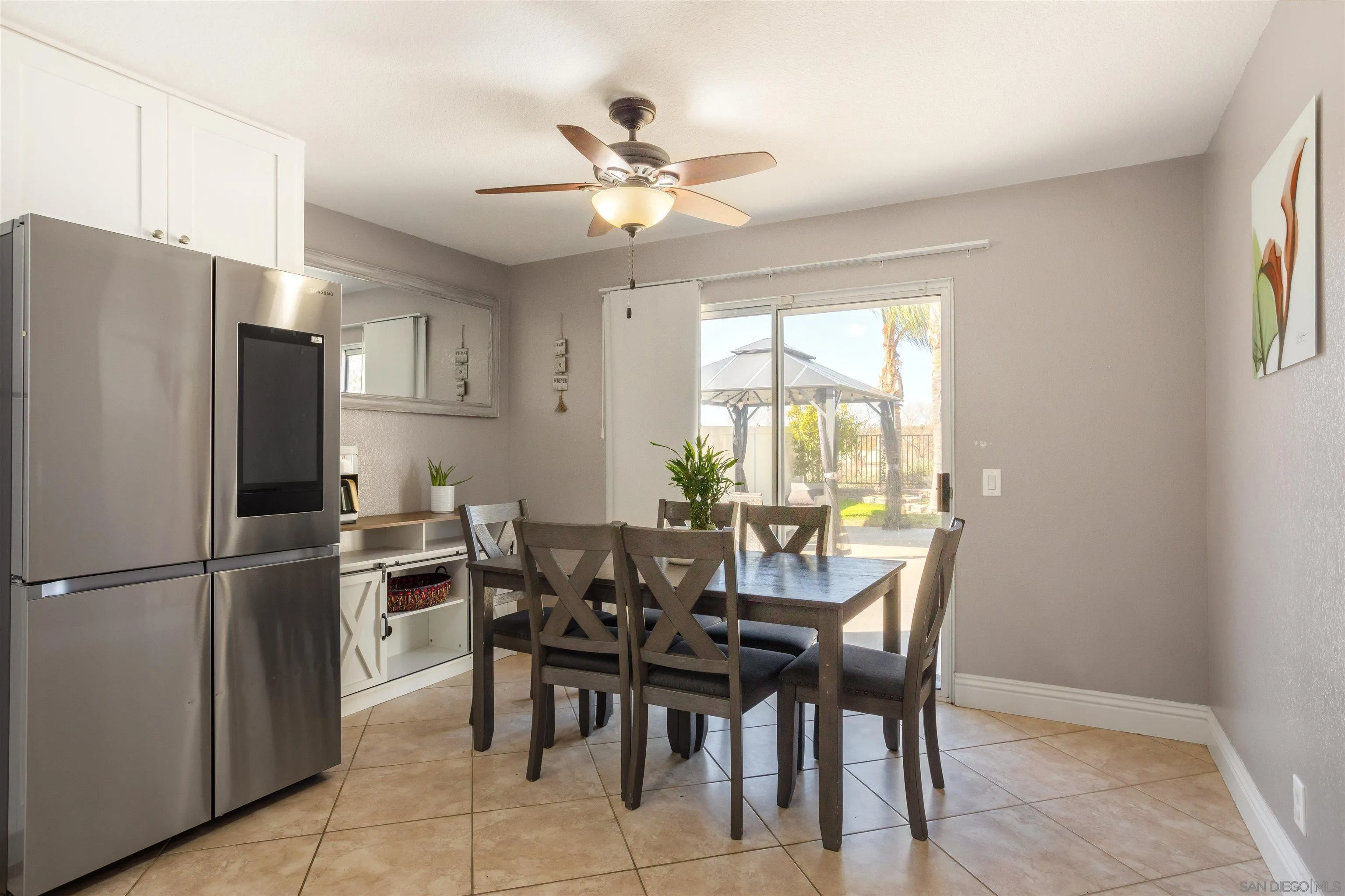 32812 Tulley Ranch Road Temecula, CA 92592 - Photo 6 of 27 a view of a dining room with furniture window and outside view