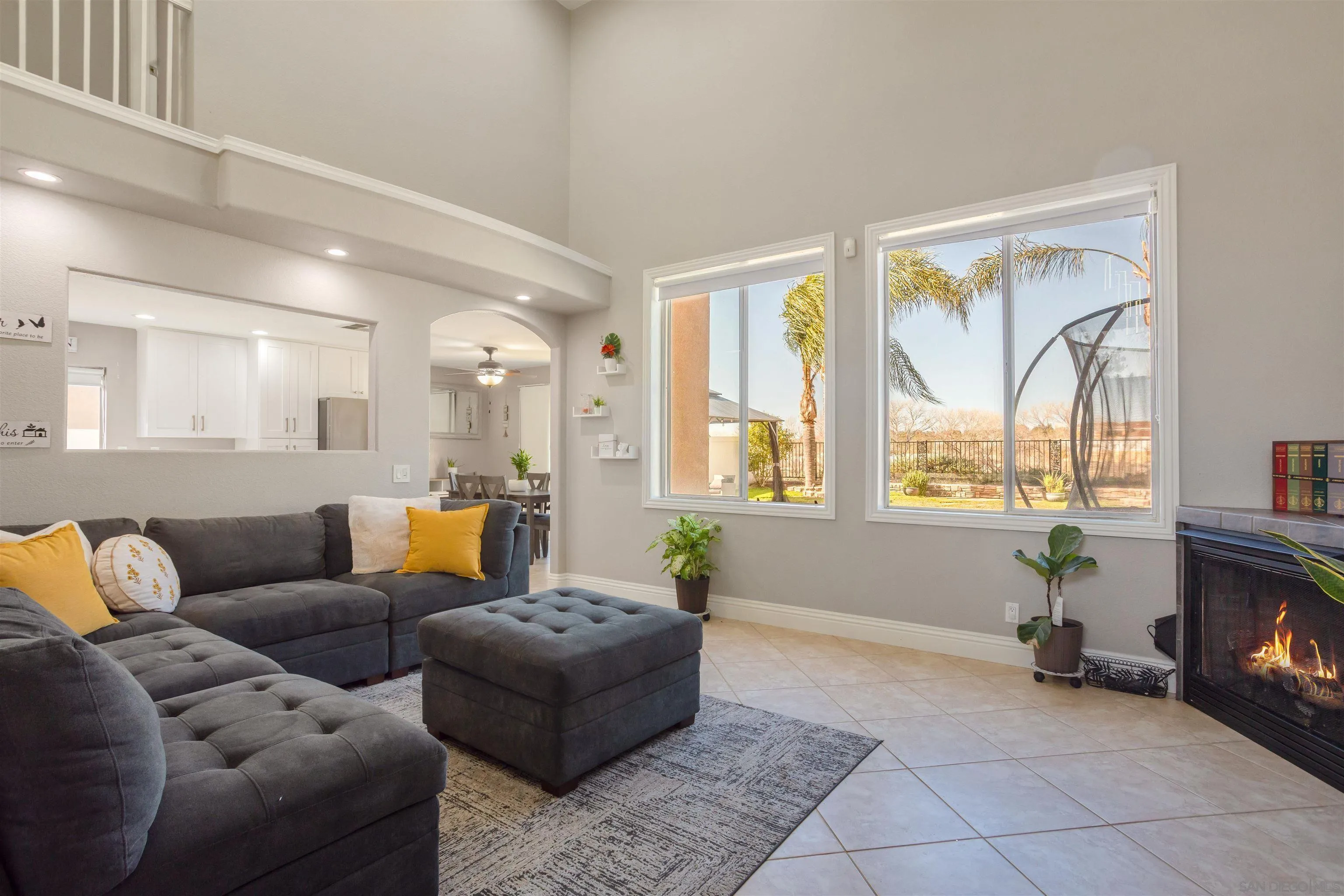 32812 Tulley Ranch Road Temecula, CA 92592 - Photo 7 of 27 a living room with furniture and a fireplace