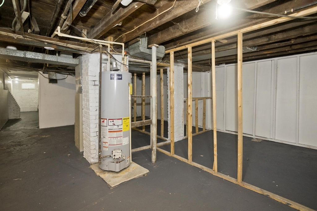 293 Eastern Avenue Springfield, MA 01109 - Photo 28 of 31 a view of a room with wooden floor