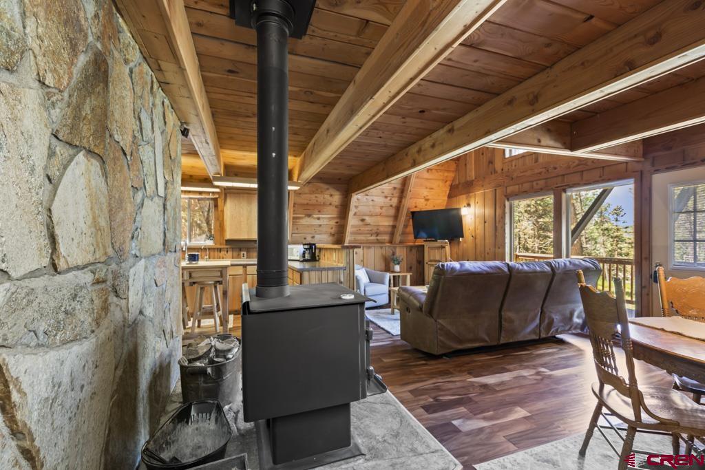 1201 Spruce Road Cimarron, CO 81220 - Photo 10 of 35 a living room with furniture a large window