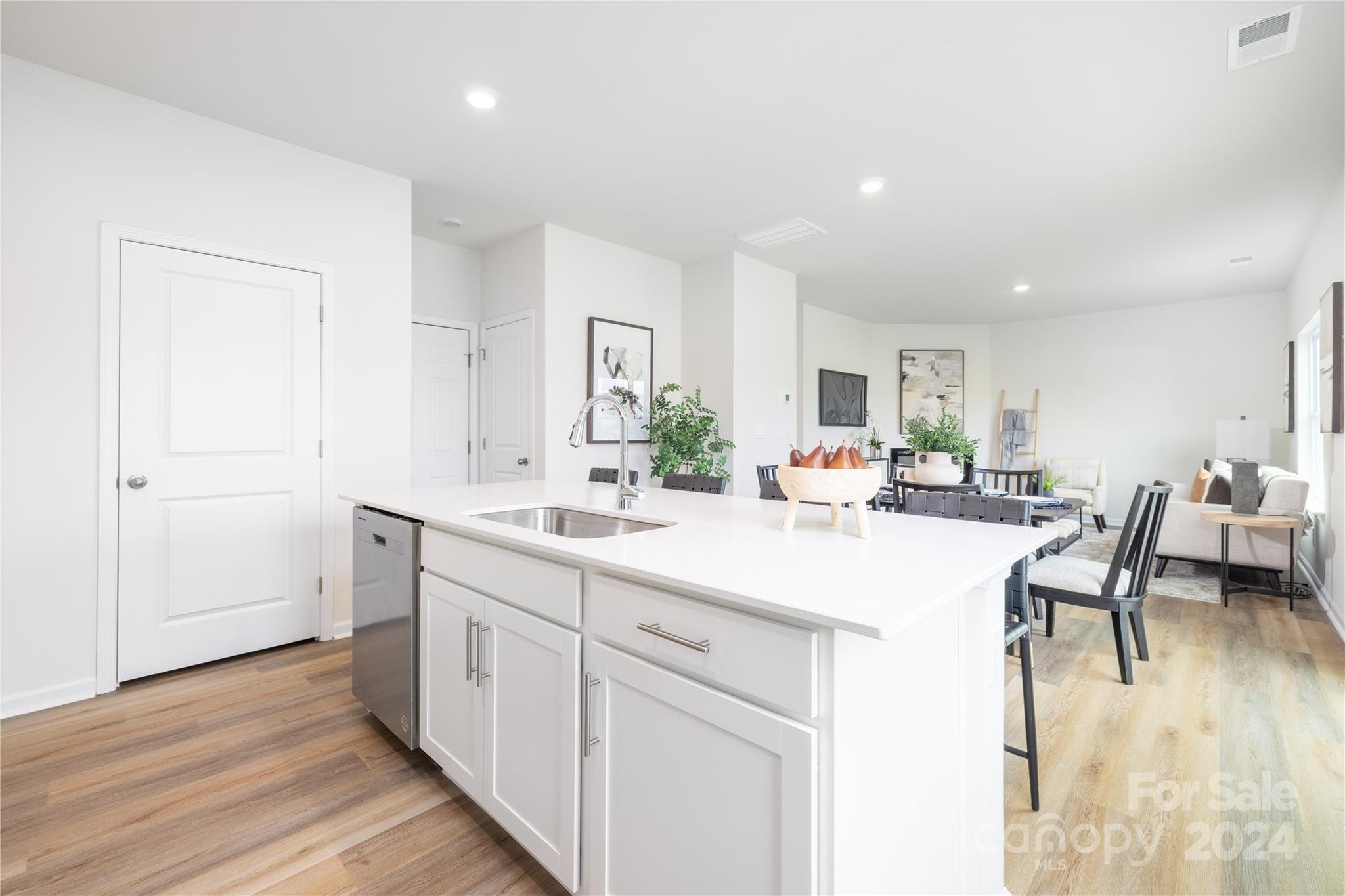 7910 Old Brk Road Sherrills Ford, NC 28673 - Photo 11 of 24 a kitchen with sink and white cabinets