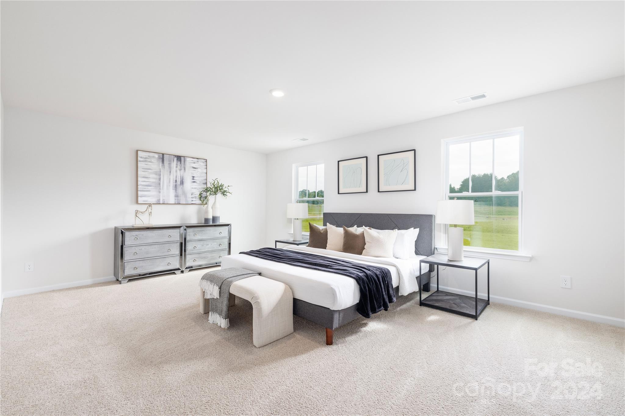 7910 Old Brk Road Sherrills Ford, NC 28673 - Photo 13 of 24 a bedroom with a bed and a lamp