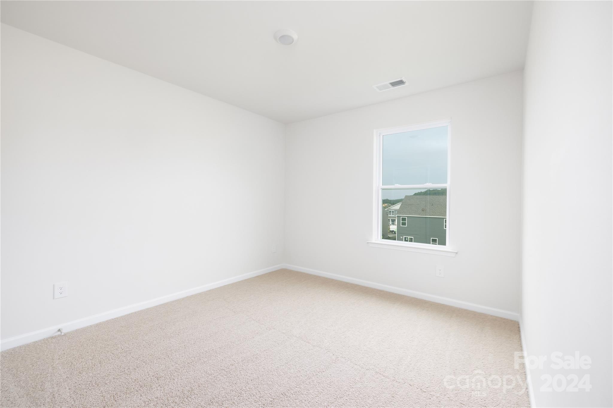 7910 Old Brk Road Sherrills Ford, NC 28673 - Photo 19 of 24 a view of an empty room with a window