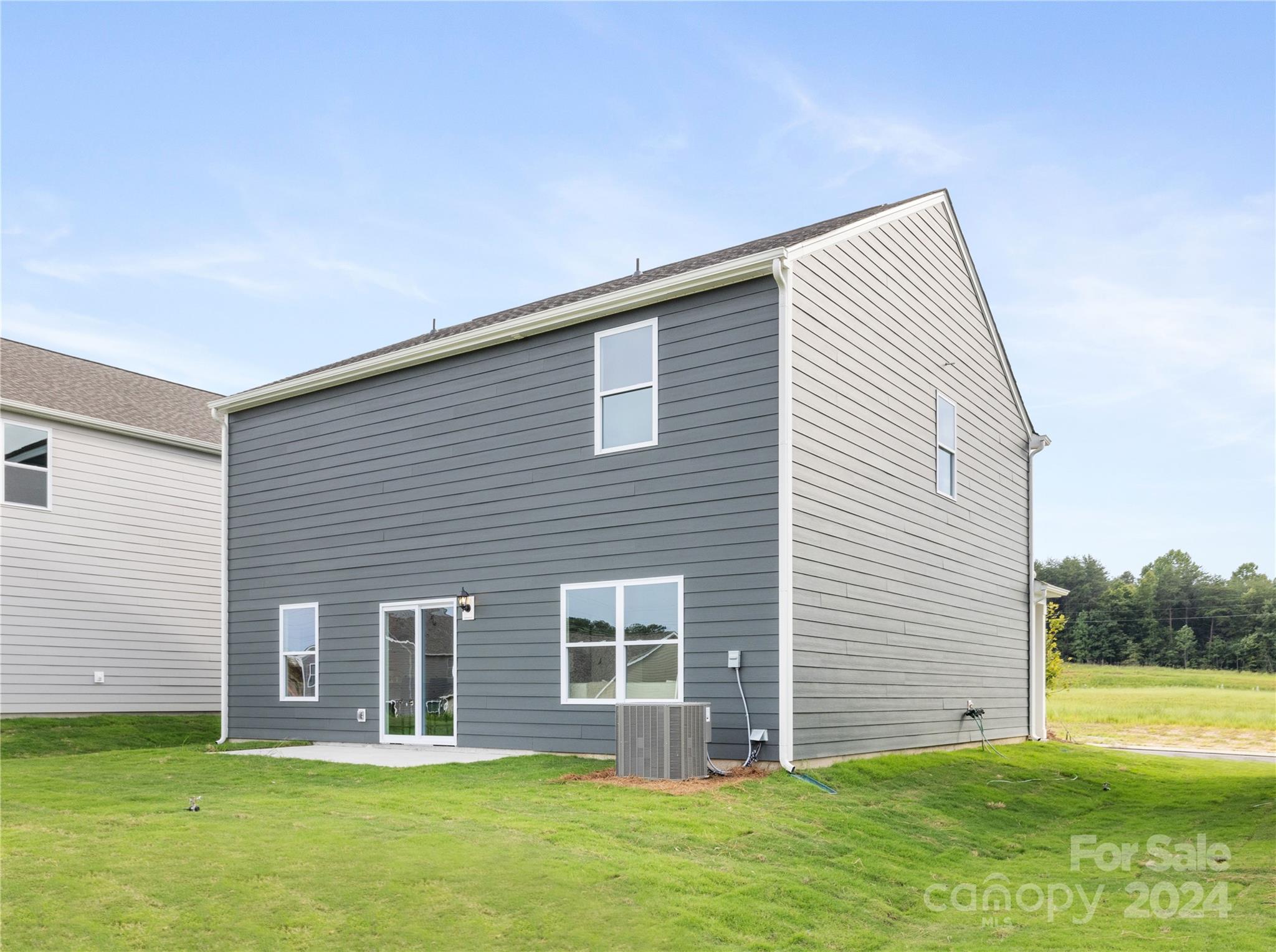 7910 Old Brk Road Sherrills Ford, NC 28673 - Photo 22 of 24 a front view of a house with a yard and trees