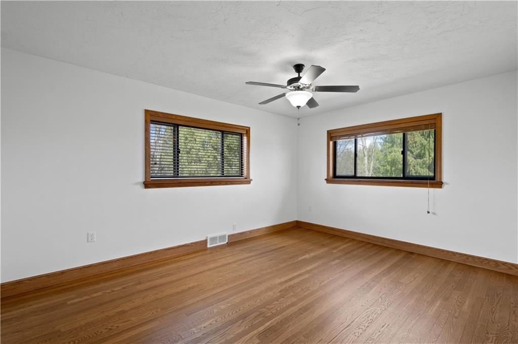 330 Center Grange Road Monaca, PA 15061 - Photo 12 of 26 a view of empty room with wooden floor and fan