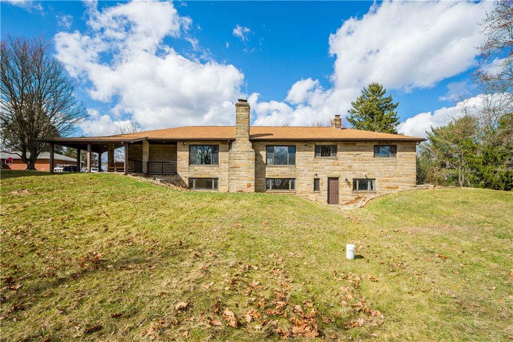 330 Center Grange Road Monaca, PA 15061 - Photo 25 of 26 a front view of a house with a garden