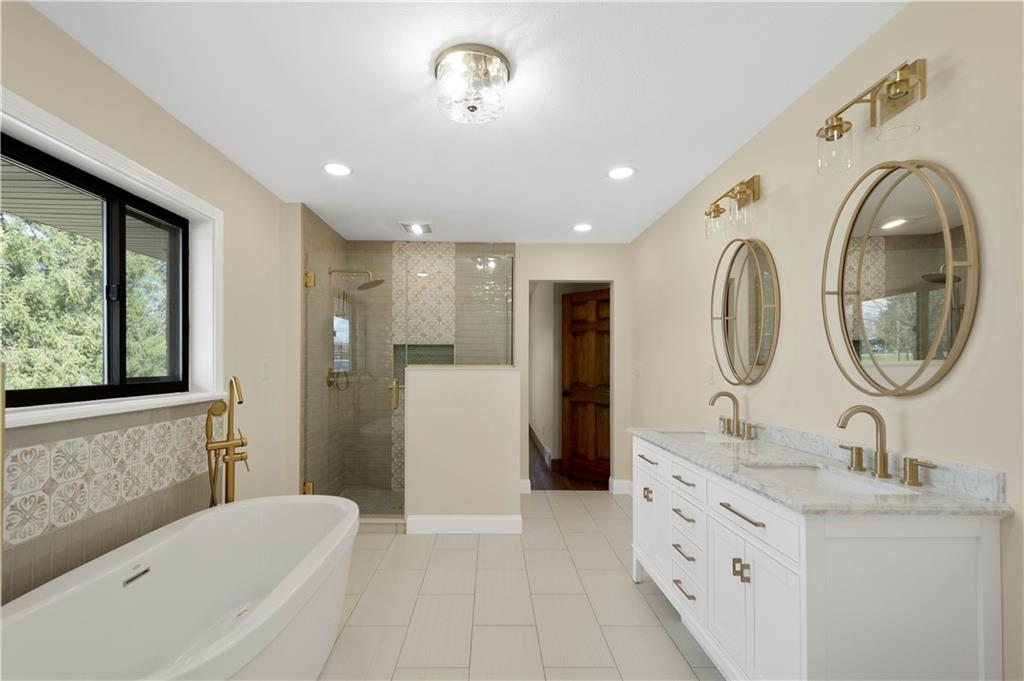 330 Center Grange Road Monaca, PA 15061 - Photo 8 of 26 a bathroom with a double vanity sink mirror and bathtub