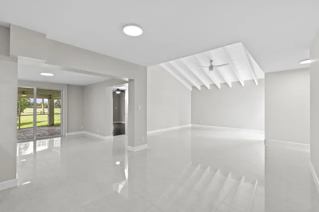 a view of an empty room and window