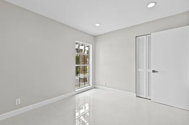 an empty room with windows