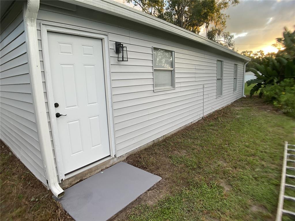 5038 Northeast Sandy Road Arcadia, FL 34266 - Photo 34 of 42 a view of a backyard