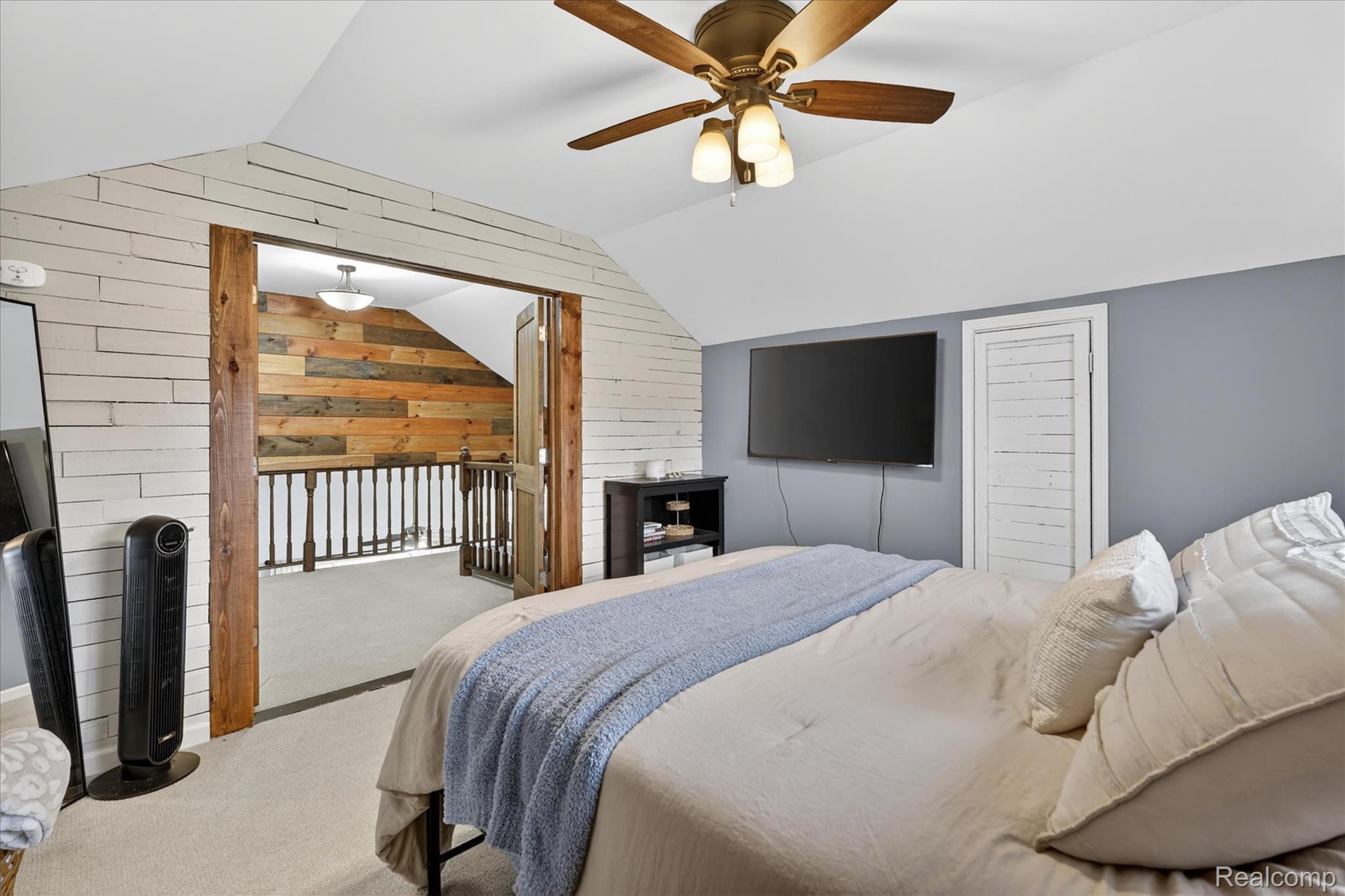 13508 North Center Road Clio, MI 48420 - Photo 22 of 38 Bedroom with wooden walls, carpet, a ceiling fan, and access to outside