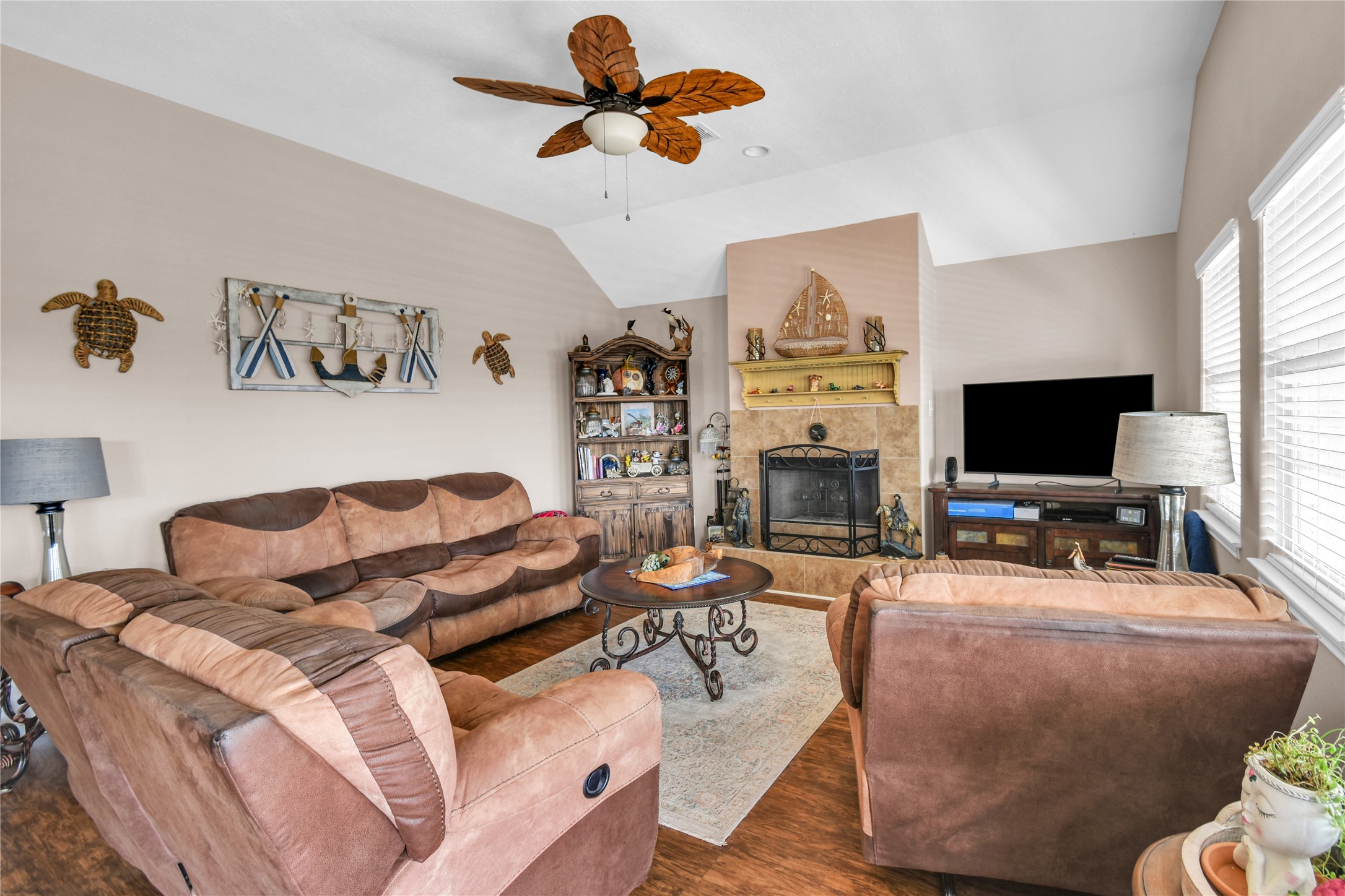 115 Driftwood Road Freeport, TX 77541 - Photo 6 of 21 a living room with furniture and a flat screen tv