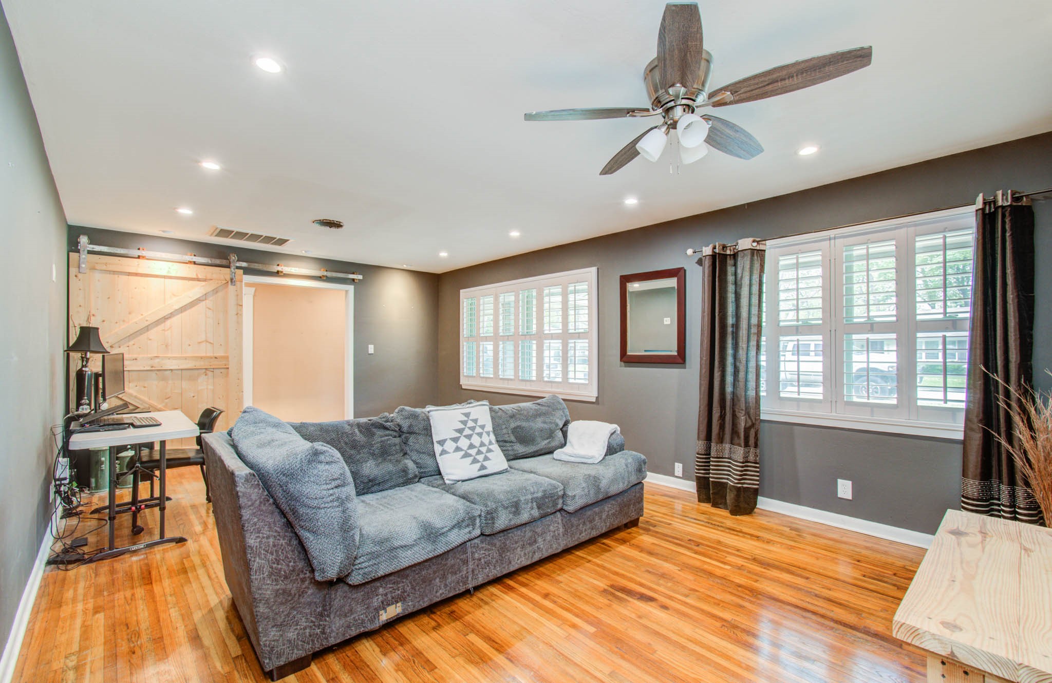 9002 Railton Street Houston, TX 77080 - Photo 17 of 32 a living room with furniture and a large window