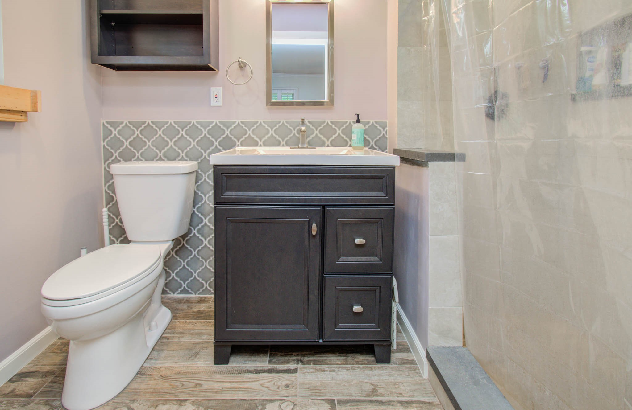 9002 Railton Street Houston, TX 77080 - Photo 26 of 32 a bathroom with a toilet and a sink