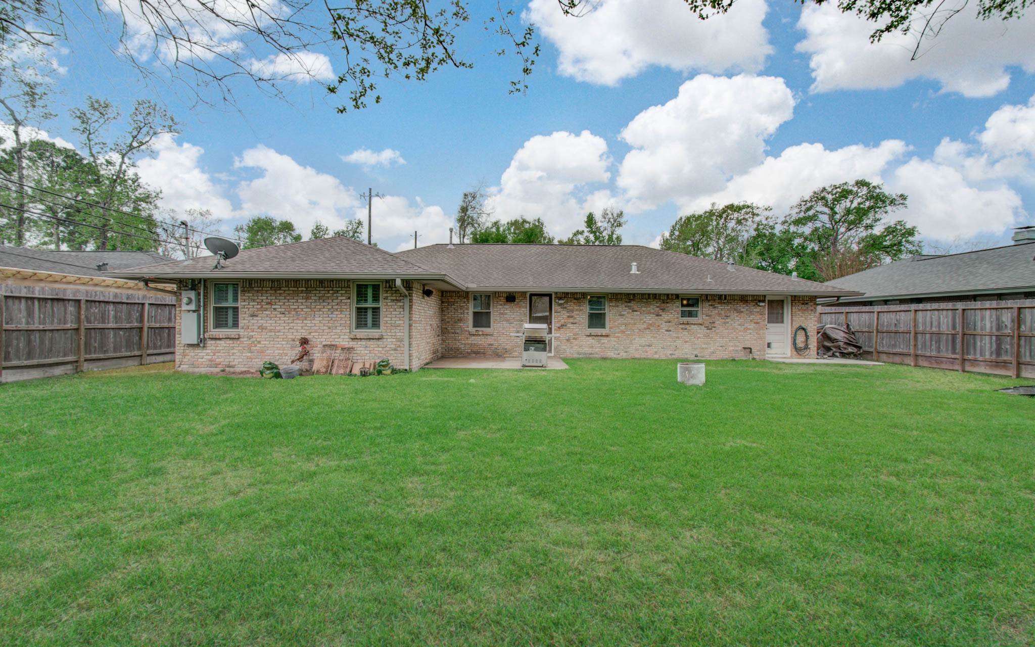 9002 Railton Street Houston, TX 77080 - Photo 30 of 32 a view of a house with a yard