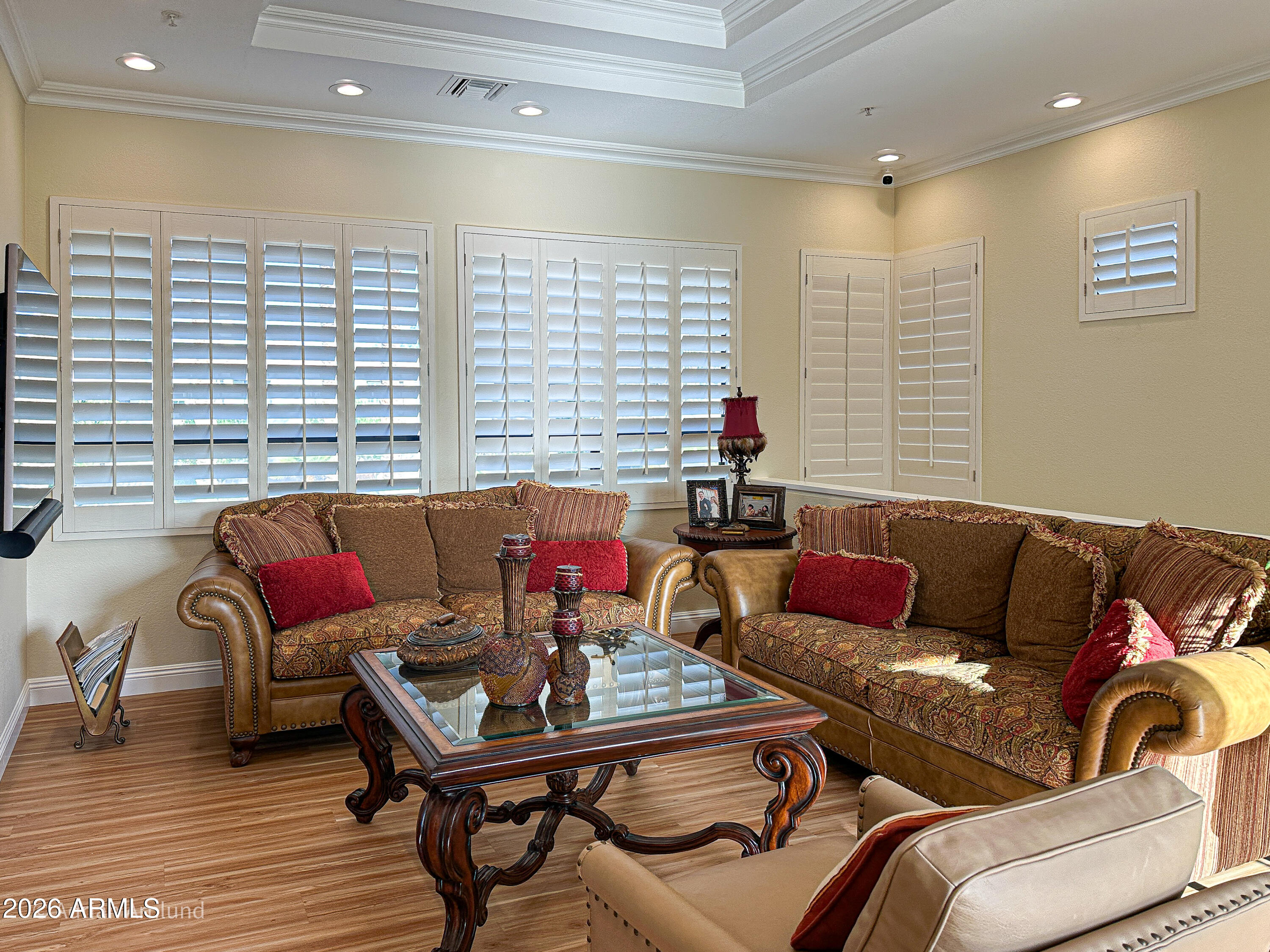 7222 East Gainey Ranch Road, Unit 224 Scottsdale, AZ 85258 - Photo 11 of 42 a living room with furniture and a large window
