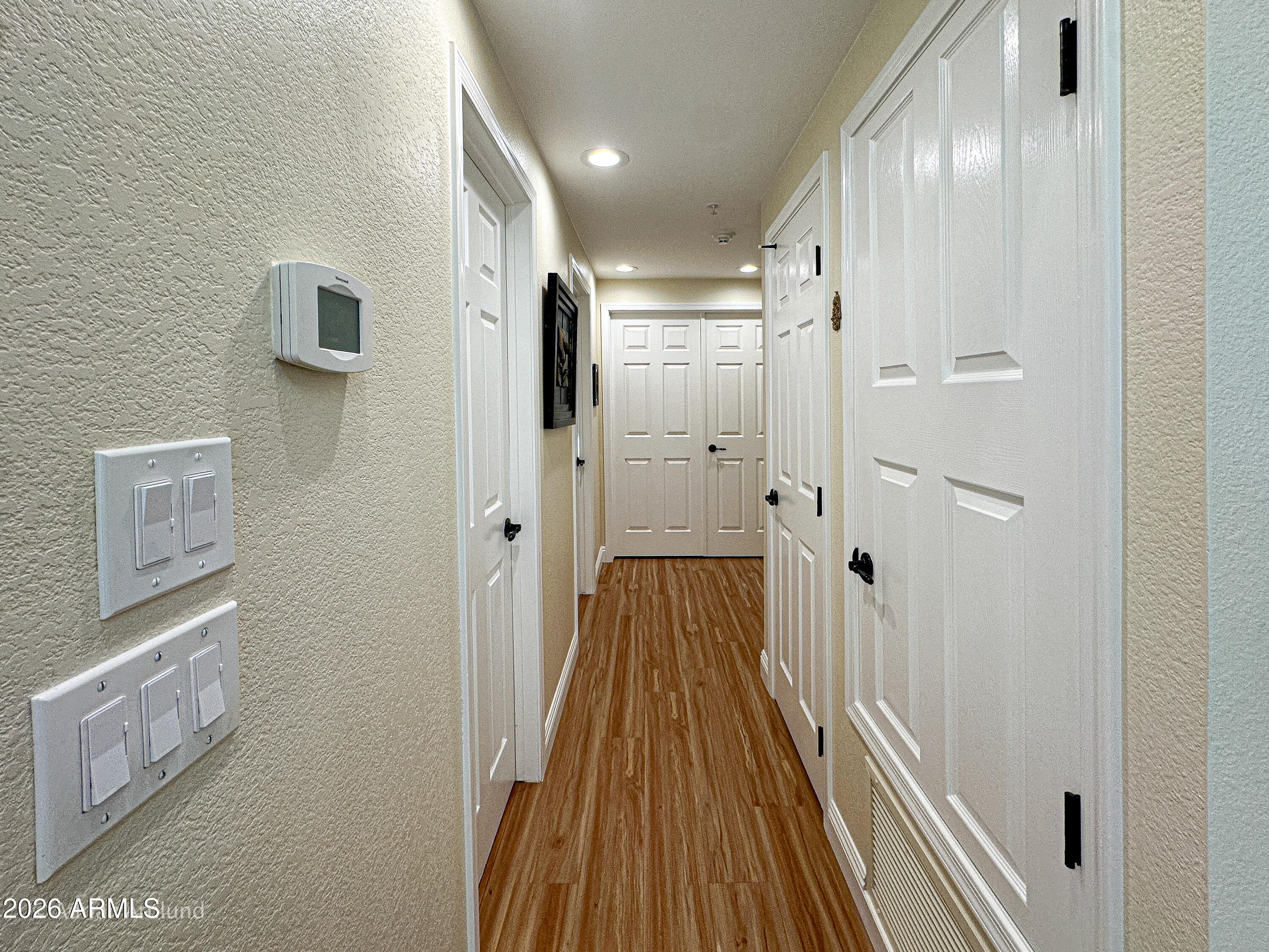 7222 East Gainey Ranch Road, Unit 224 Scottsdale, AZ 85258 - Photo 14 of 42 a bathroom with a glass shower door and a sink