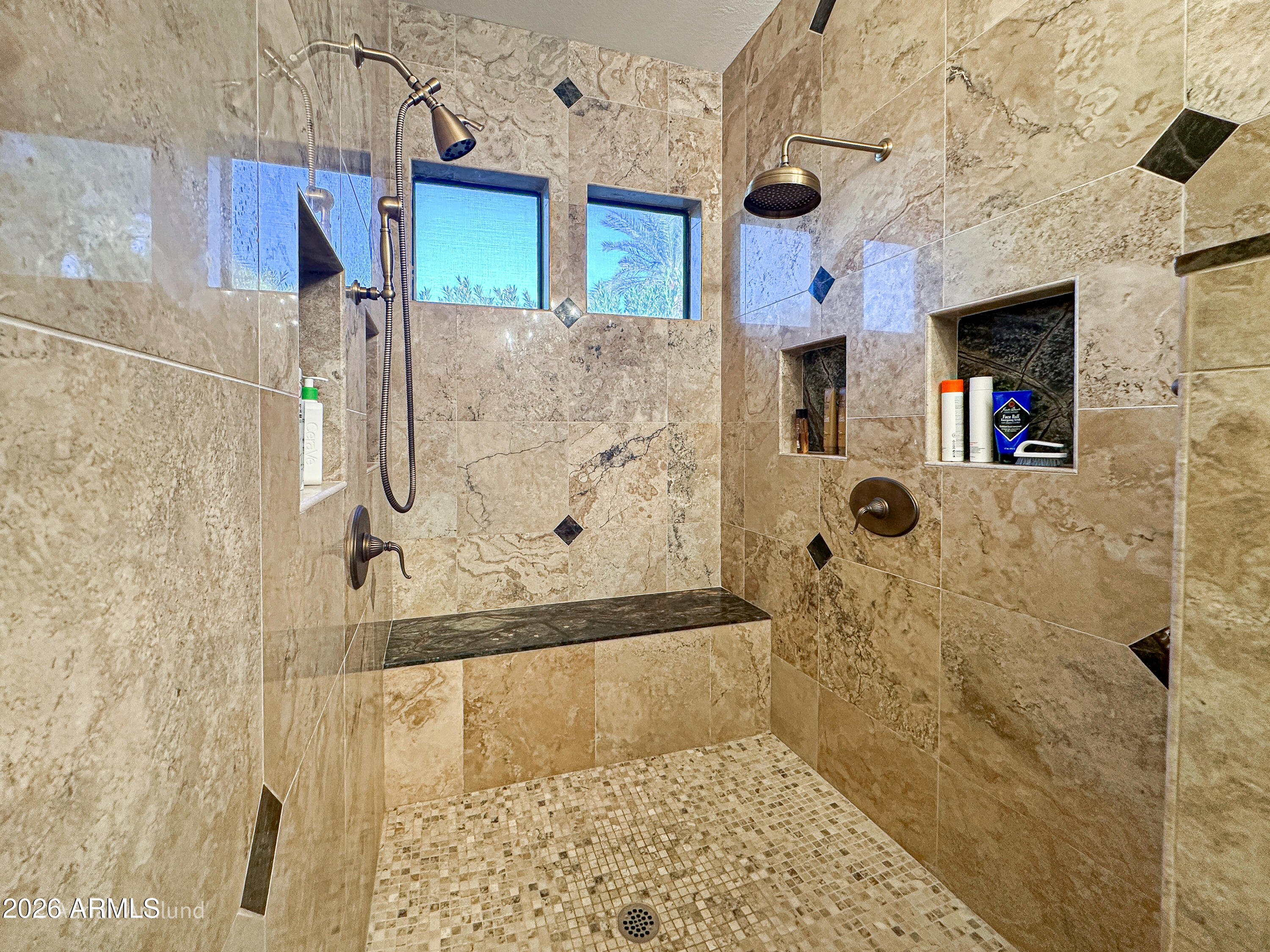 7222 East Gainey Ranch Road, Unit 224 Scottsdale, AZ 85258 - Photo 17 of 42 a bathroom with a shower