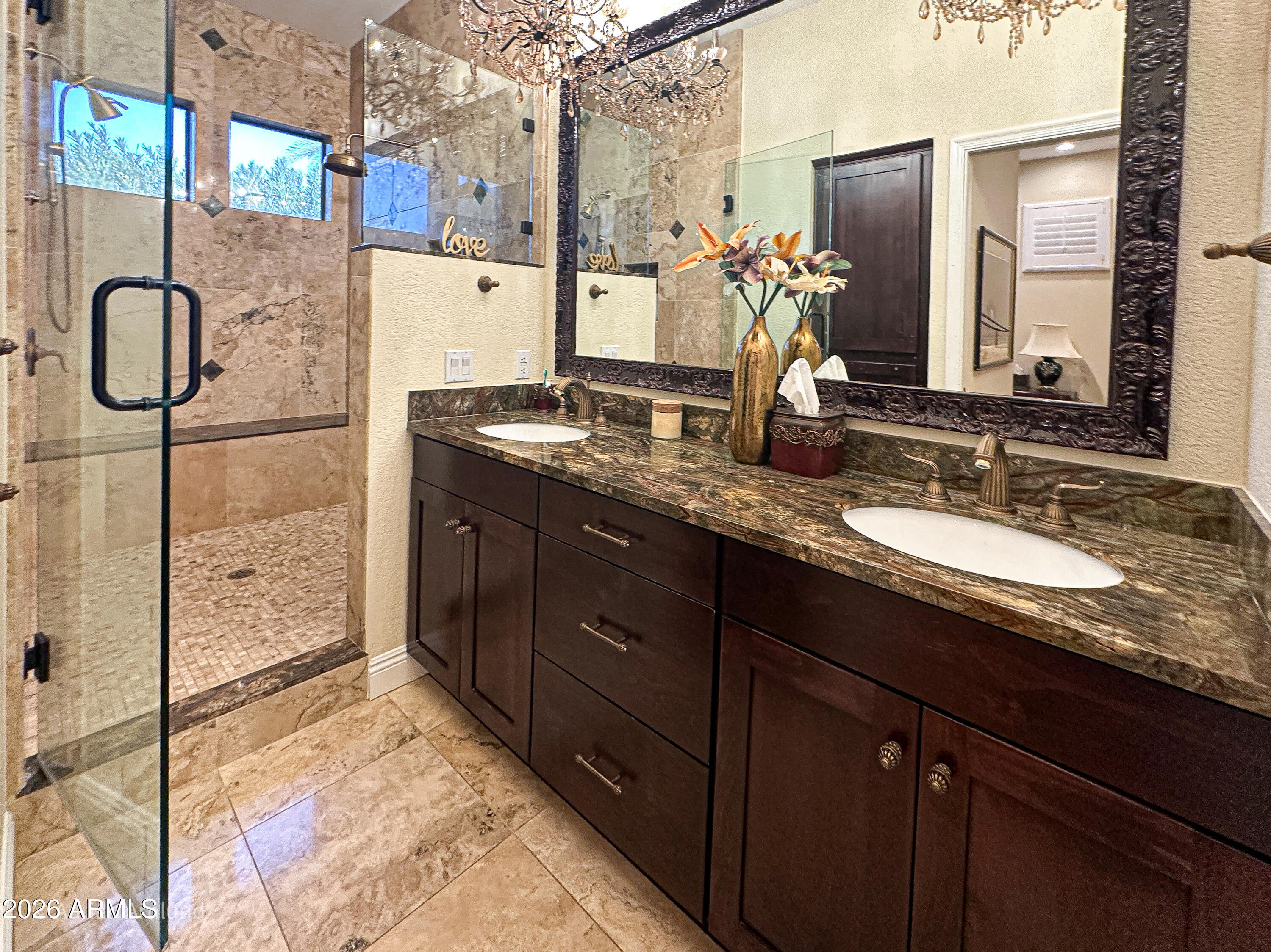 7222 East Gainey Ranch Road, Unit 224 Scottsdale, AZ 85258 - Photo 19 of 42 a bathroom with a granite countertop sink vanity and mirror