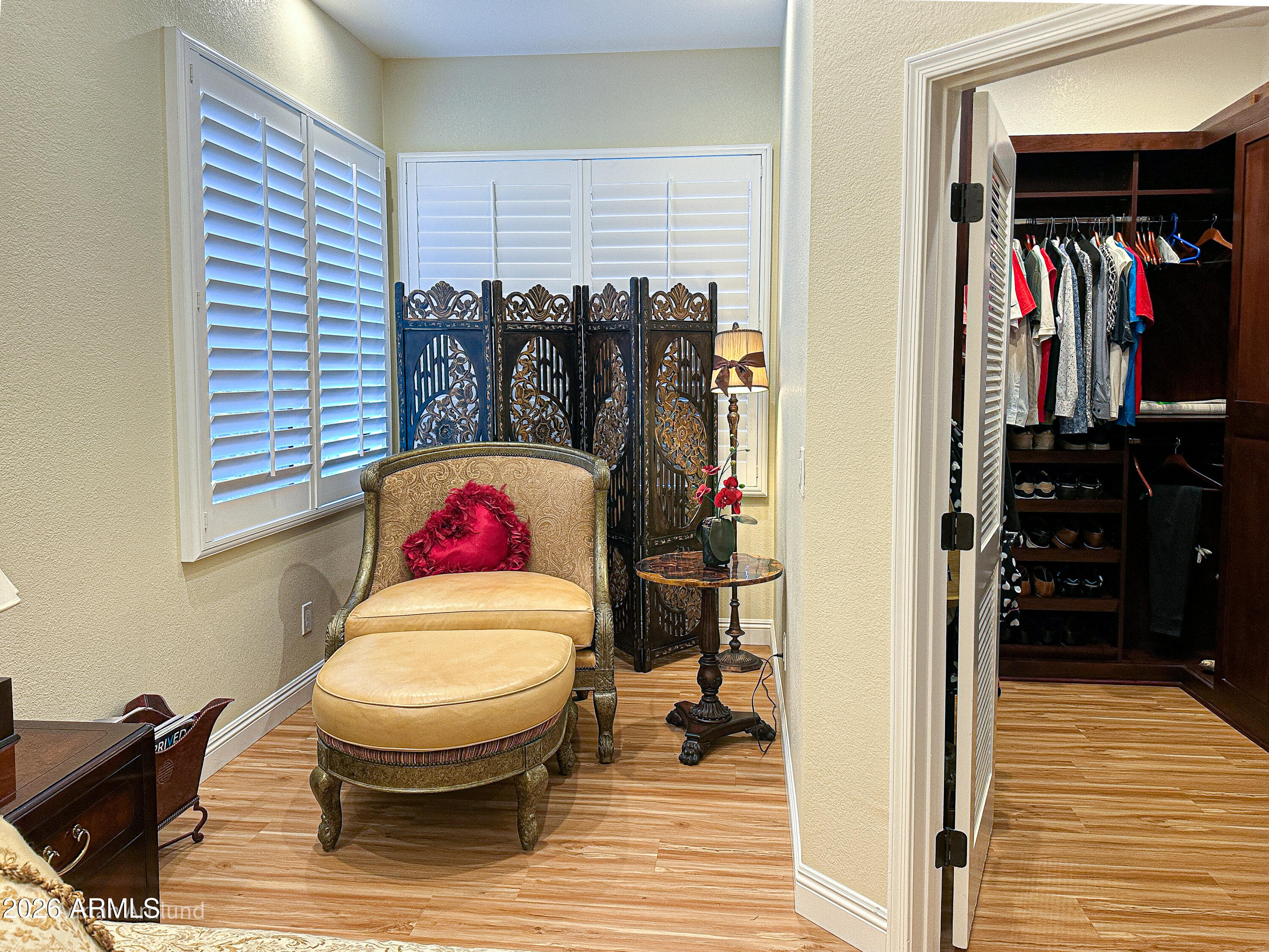7222 East Gainey Ranch Road, Unit 224 Scottsdale, AZ 85258 - Photo 22 of 42 a view of walk in closet with clothes and shoes