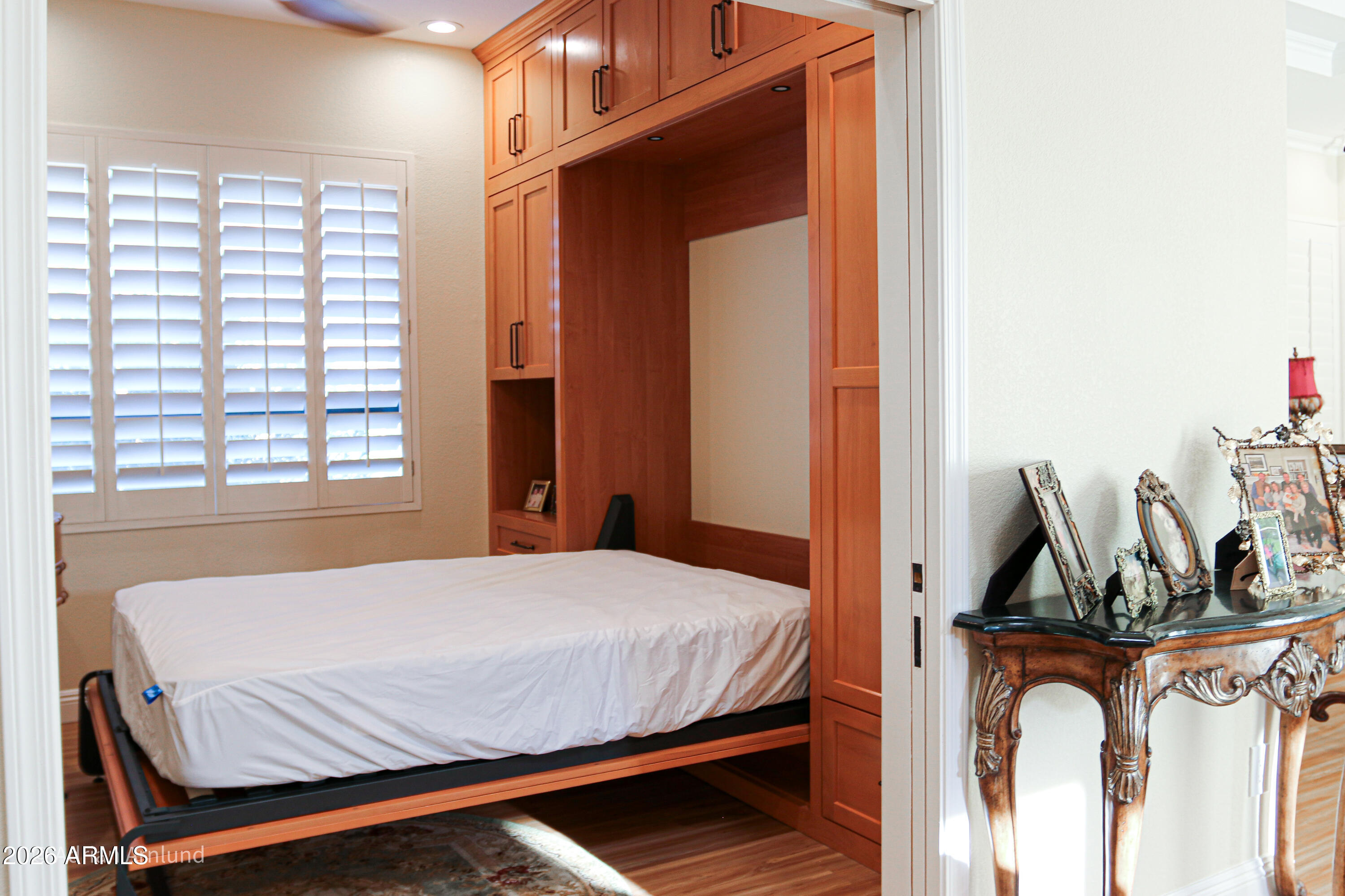 7222 East Gainey Ranch Road, Unit 224 Scottsdale, AZ 85258 - Photo 36 of 42 a bedroom with a bed and a closet