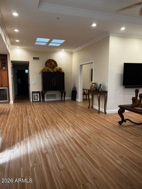 7222 East Gainey Ranch Road, Unit 224 Scottsdale, AZ 85258 - Photo 39 of 42 a lobby with furniture and a flat screen tv