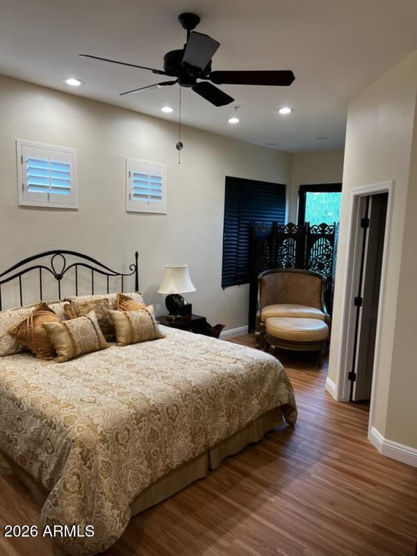 7222 East Gainey Ranch Road, Unit 224 Scottsdale, AZ 85258 - Photo 40 of 42 a bedroom with two beds and a flat screen tv