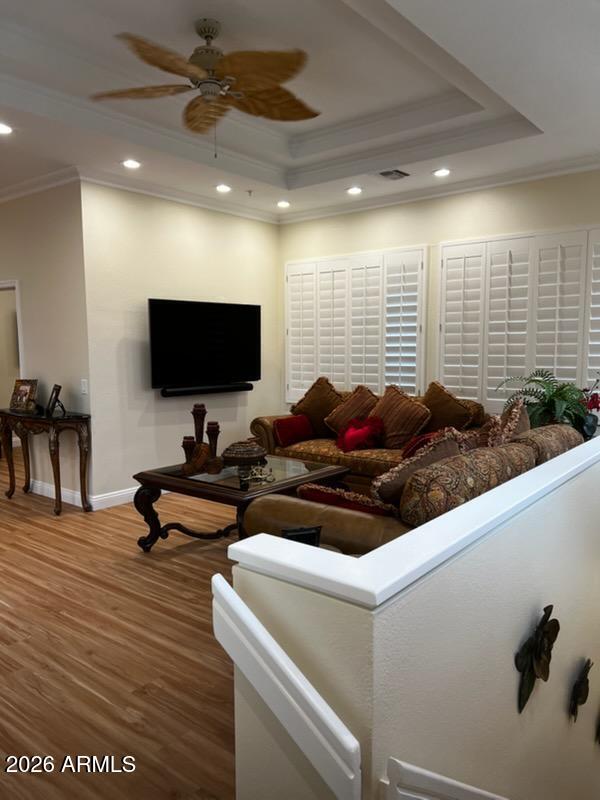 7222 East Gainey Ranch Road, Unit 224 Scottsdale, AZ 85258 - Photo 41 of 42 a living room with furniture and a flat screen tv