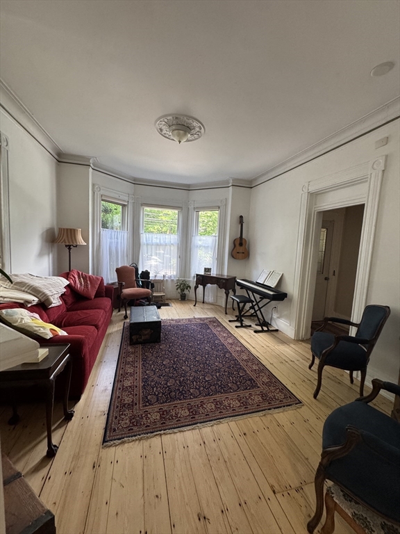 5 Spring Park Avenue, Unit 1 Boston, MA 02130 - Photo 2 of 24 a living room with furniture rug and window