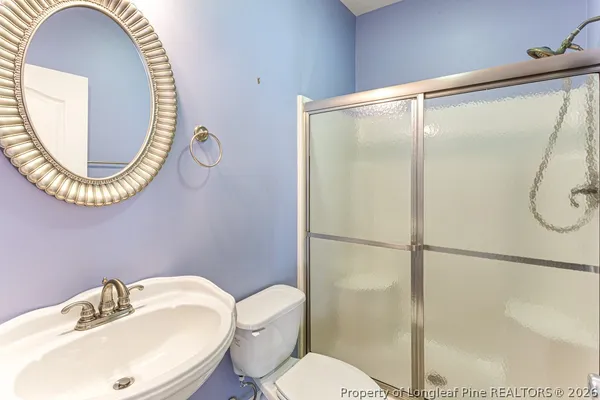 a bathroom with a bathtub and a sink