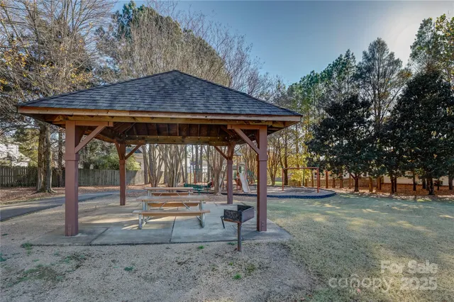 a view of backyard with green space