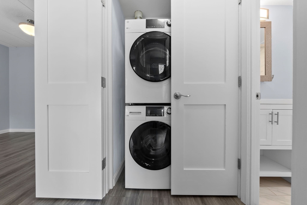 133 Franklin Street, Unit 503 Stoneham, MA 02180 - Photo 14 of 23 a utility room with dryer and washer