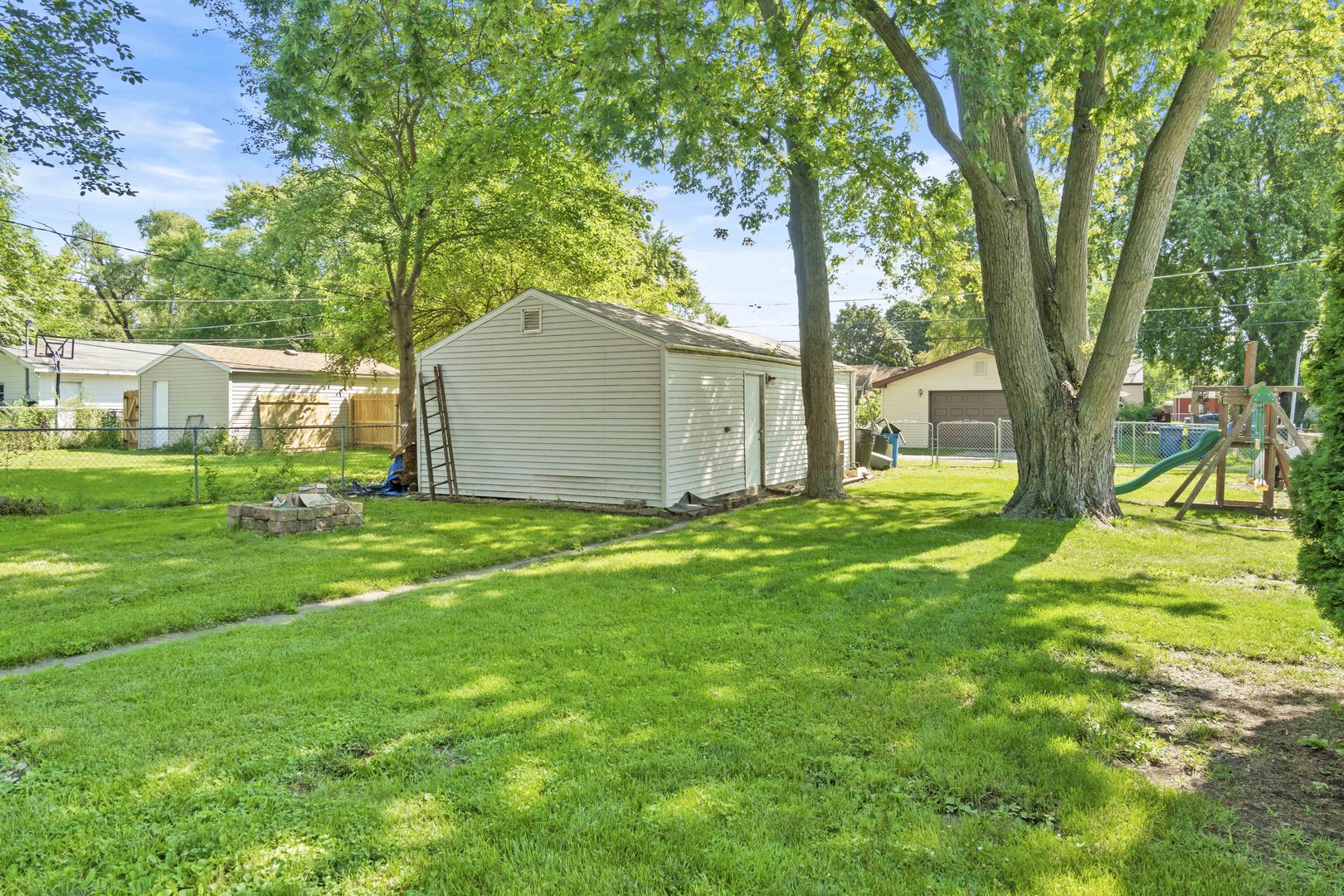 1548 South 5th Avenue Kankakee, IL 60901 - Photo 14 of 18 a view of a house with a backyard