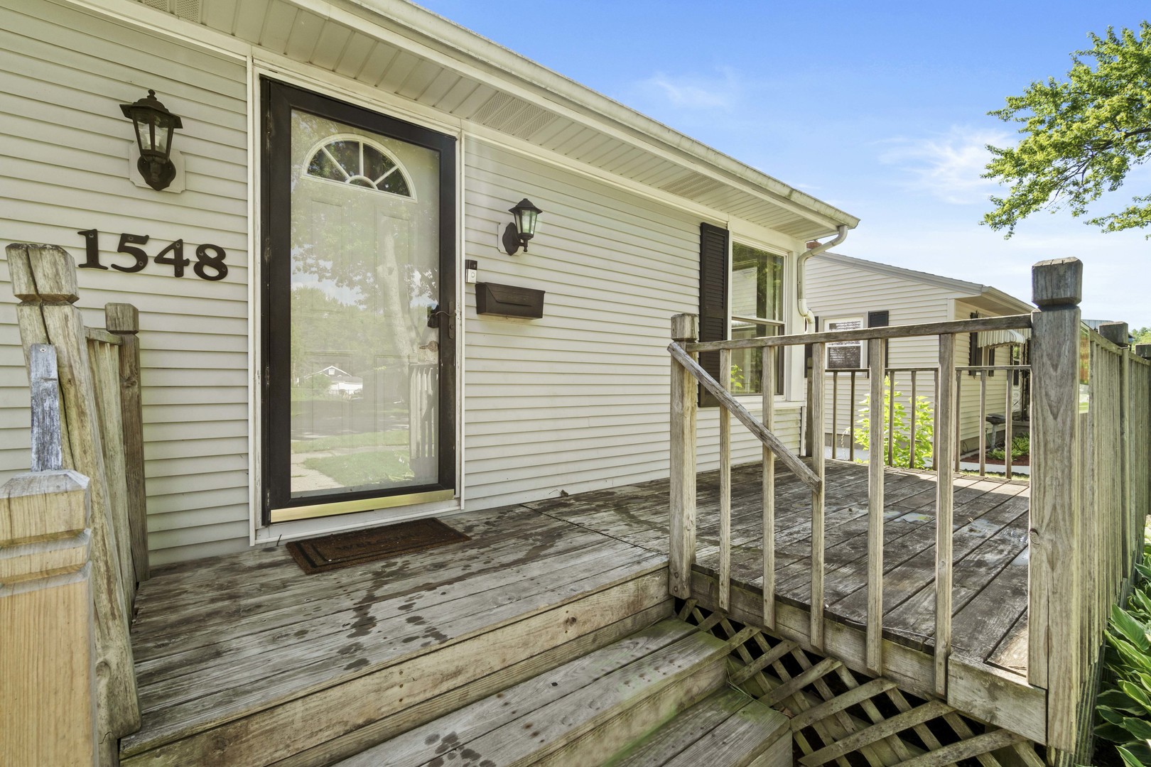 1548 South 5th Avenue Kankakee, IL 60901 - Photo 3 of 18 a view of a house with a door and wooden floor