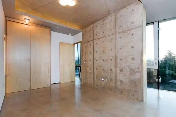 a bathroom with a double vanity sink and a large mirror