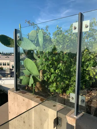 a view of a balcony with two chairs