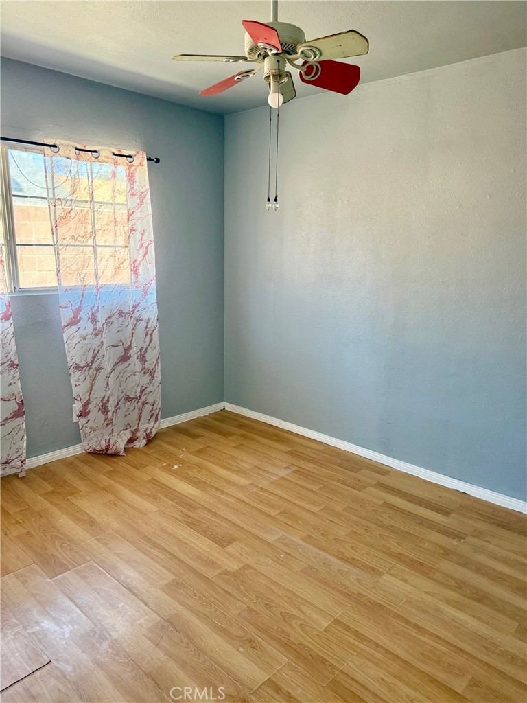 12931 Fourth Street Chino, CA 91710 - Photo 28 of 34 a view of a room with window and wooden floor