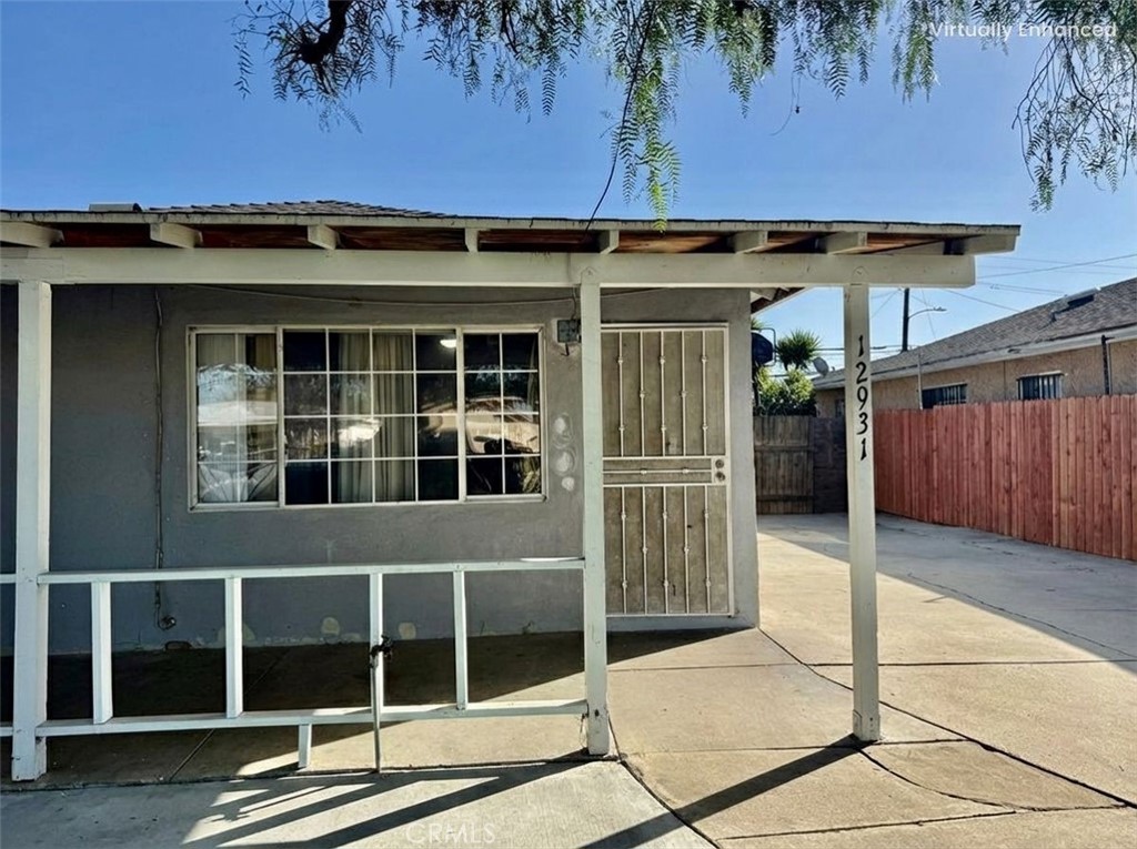 12931 Fourth Street Chino, CA 91710 - Photo 4 of 34 a view of a house with a backyard