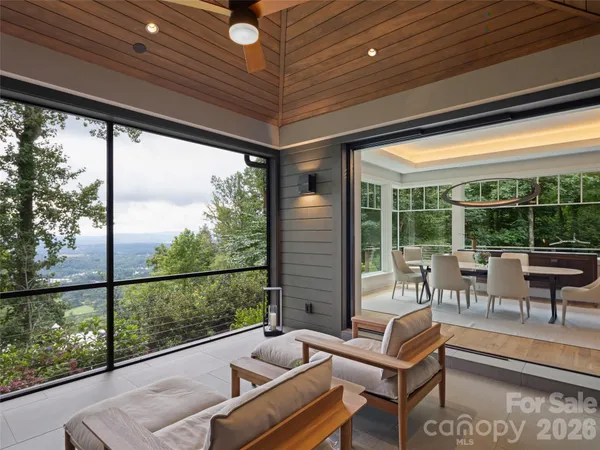 a outdoor space with patio the couches and dining table with garden view