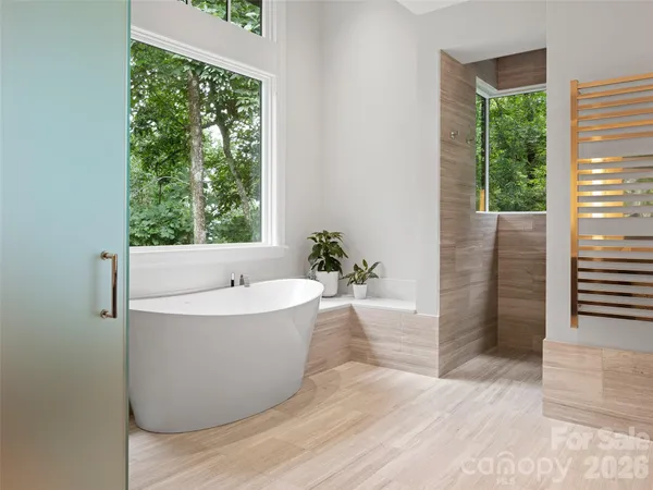 a view of a bathtub in a bathroom