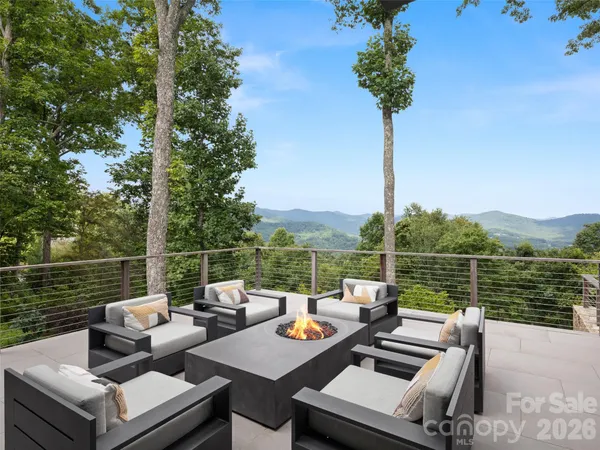 a terrace view with sitting space and seating area