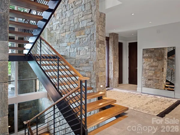 a view of entryway with a front door