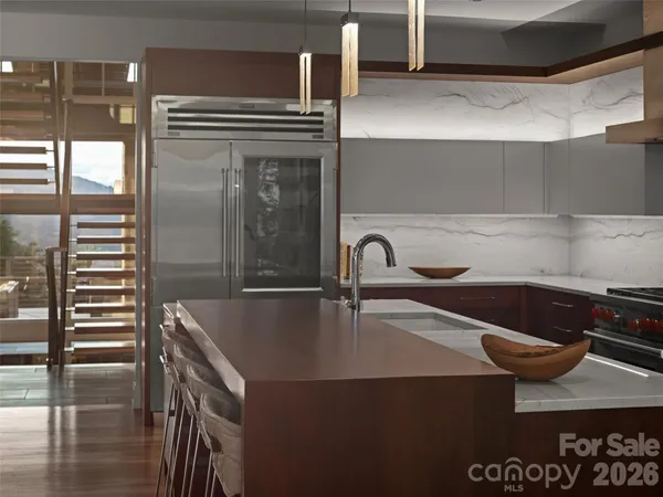 a kitchen with a sink and a refrigerator